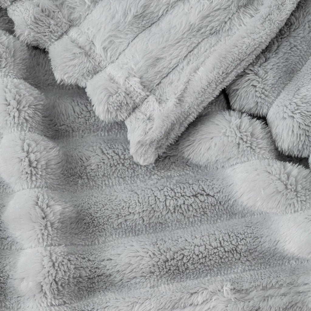 Cream-colored cozy flannel nap blanket 